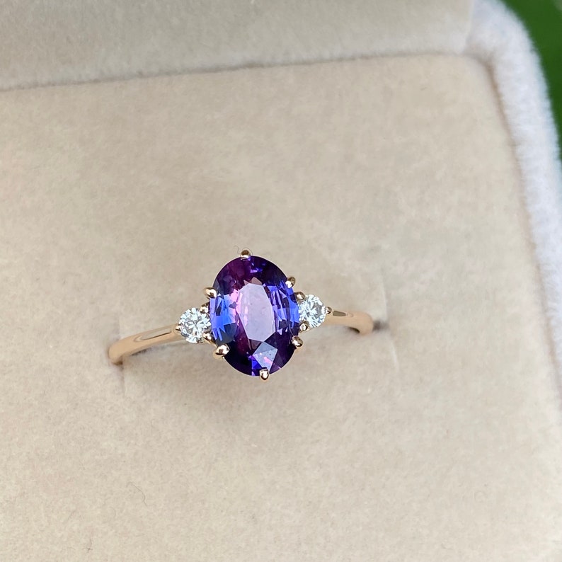 Very Unique untreated lavender sapphire three stone engagement ring