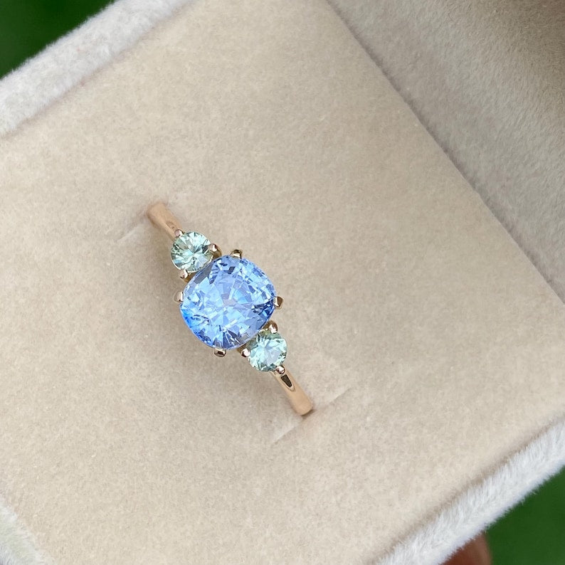 Light Blue Sapphire three stone Engagement Ring